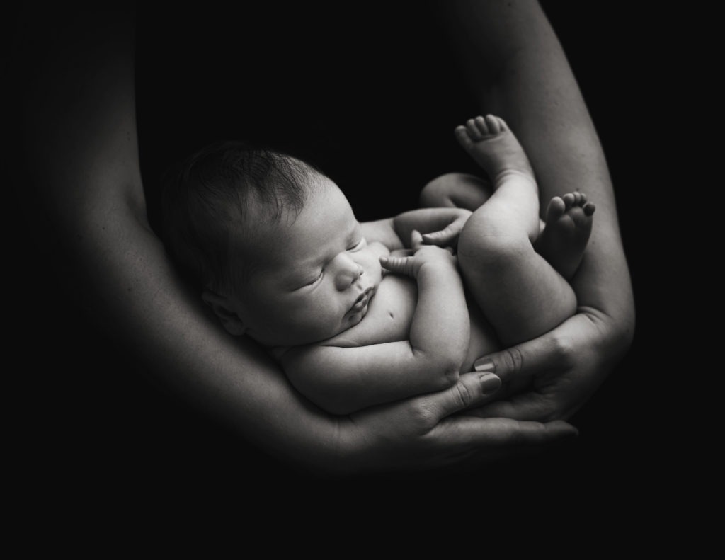 Photographer Interview Russ Jackson newborn in hands