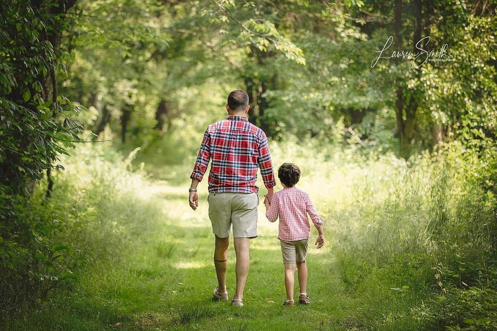 dad walking with child