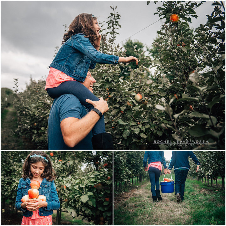 family in apple orchard