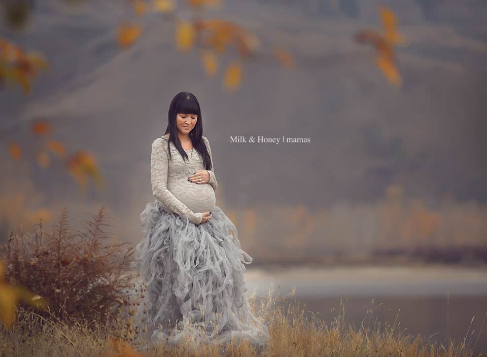pregnant women with fall foliage