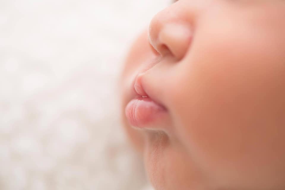 newborn macro photography of lips