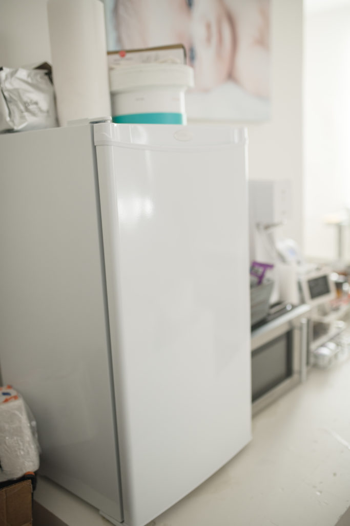 white mini-fridge